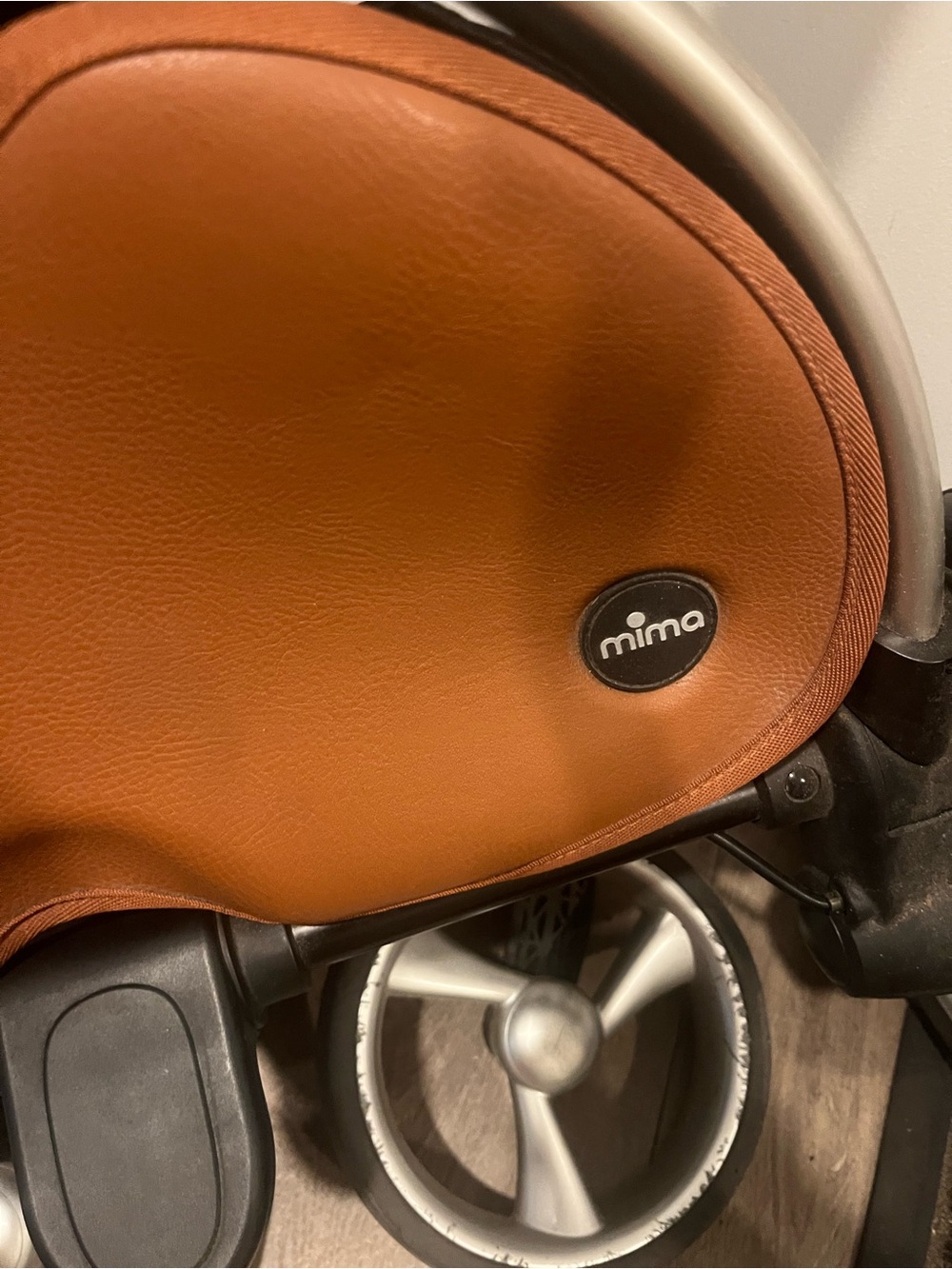 Mima Kids Seat in Brown - Stylish Ride-On Accessory